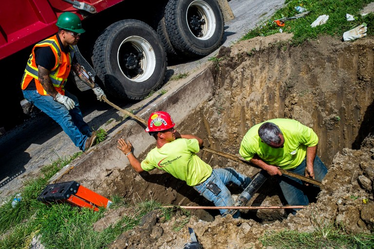 Recent test results show homes still have high amounts of lead in their drinking water and only a few in the city have had their lead pipes removed. (Jake May/The Flint Journal-MLive.com via AP)