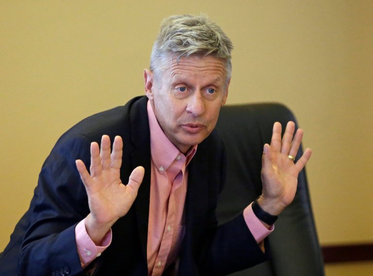 Gary Johnson and Bill Weld have some hurdles to clear besides name recognition, fundraising and an absence from the debates. (AP Photo)