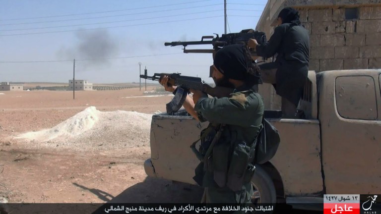 Islamic State fighters fled the Syrian city of Manbij in convoys packed with civilian hostages, (Militant Photo via AP, File)