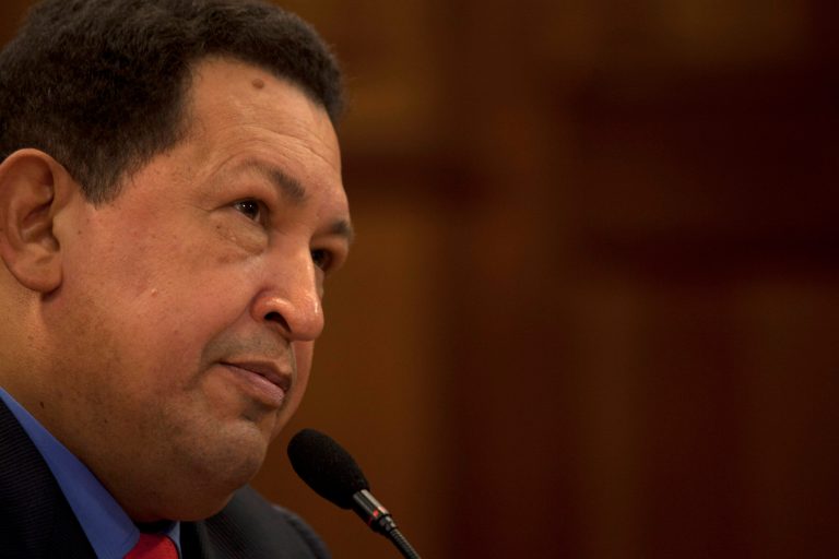   FILE - In this Tuesday, Oct. 9, 2012 file photo, Venezuela's President Hugo Chavez, during a press conference at the Miraflores palace in Caracas, Venezuela. Venezuelan President Hugo Chavez has arrived back home in Caracas after 10 days of medical treatment in Cuba. State television showed images of Chavez arriving at Caracas' airport early Friday, Dec. 7, 2012, and walking down the steps of the presidential jet. (AP Photo/Nicolas Garcia, File)  