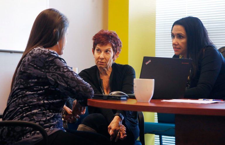 About one in five insured people are having trouble paying their medical bills, a new poll finds. (AP Photo/Ross D. Franklin)