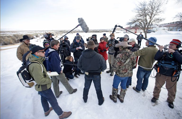One of the sons of Nevada rancher Cliven Bundy speaks with reporters during a news conference near Burns, Ore. (AP Photo/Rick Bowmer)