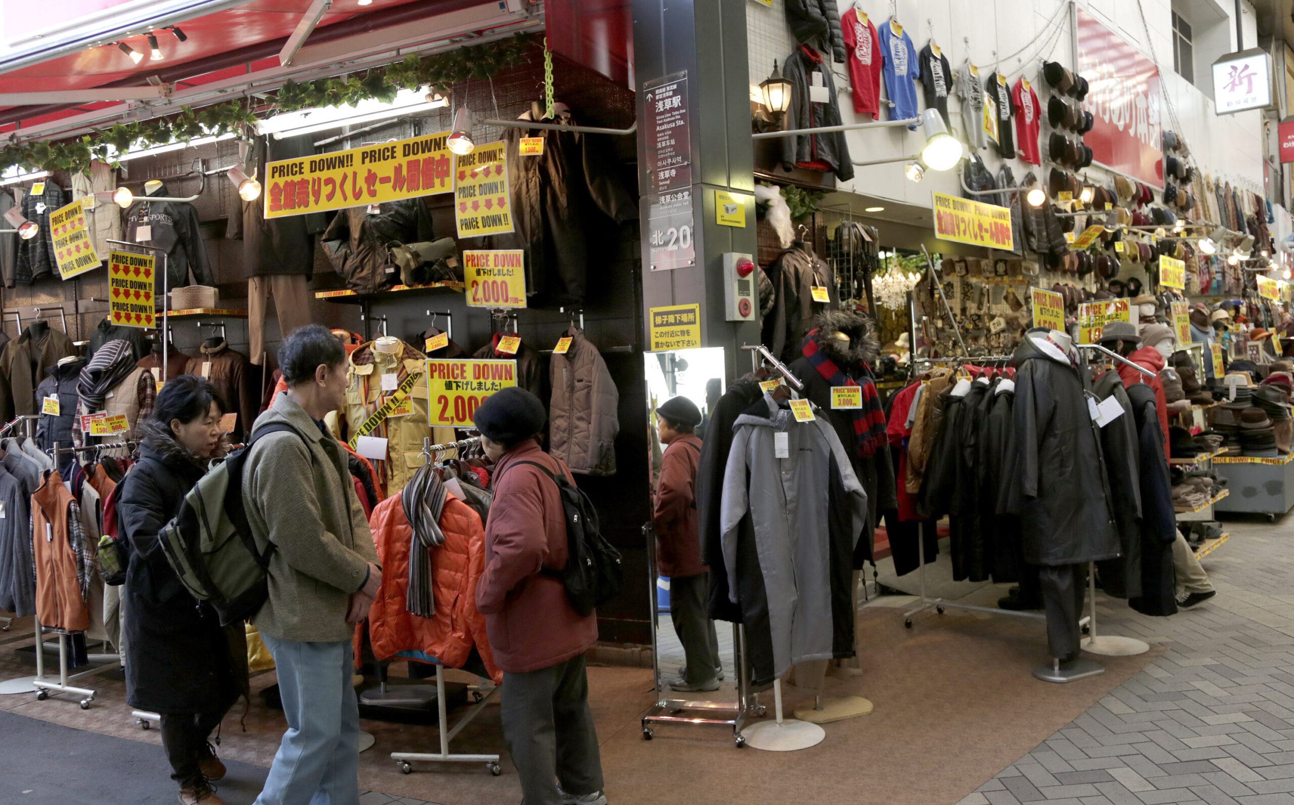 Japan economy holds steady as tax hike looms