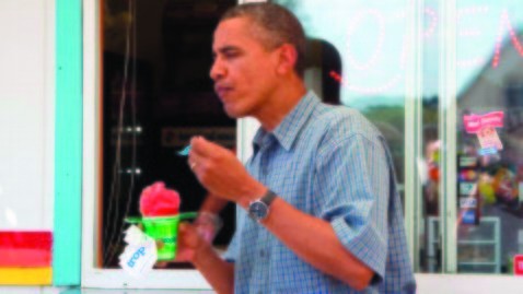 Without Michelle, Obama gorges like Clinton
