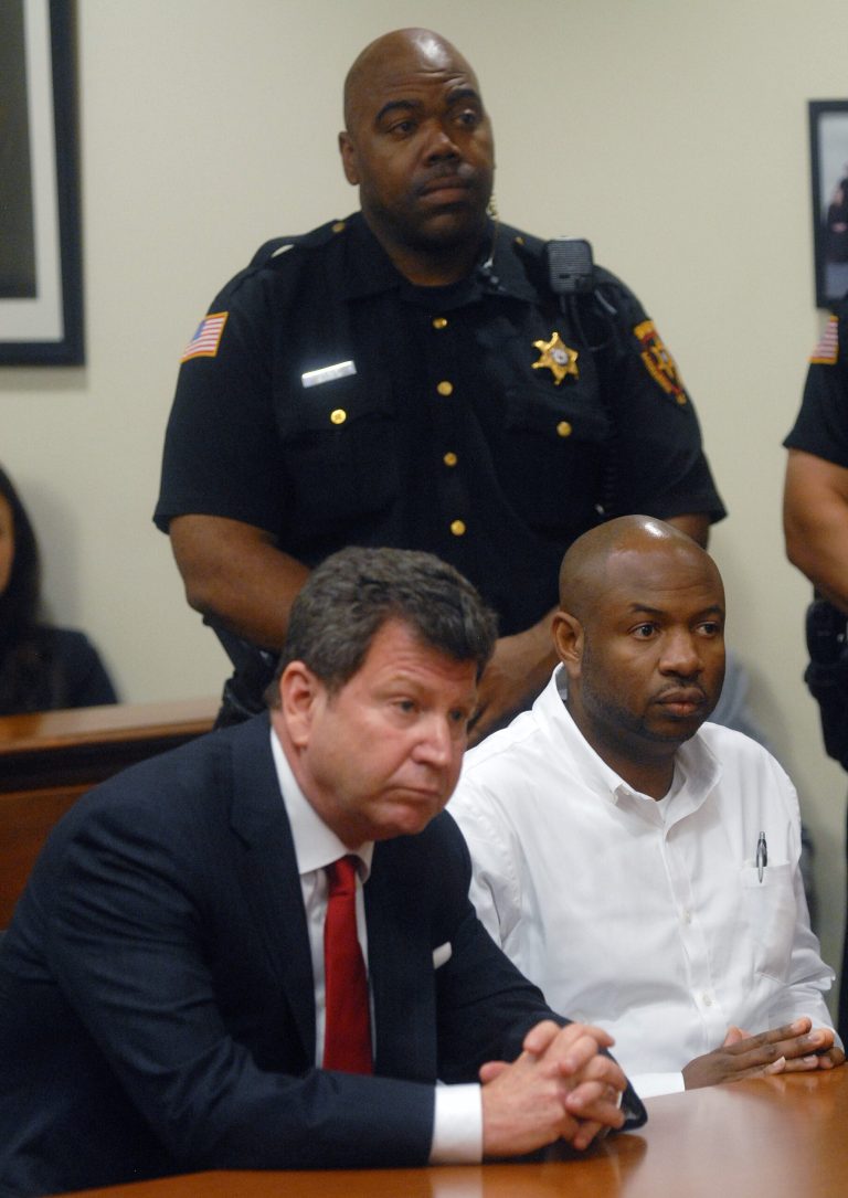 Kevin Roper, right, and his attorney David Glassman listen during Roper's arraignment at the Middlesex County Courthouse Wednesday, June 11, 2014, in New Brunswick, N.J. Roper, a Wal-Mart truck driver from Georgia, pleaded not guilty to death by auto and assault by auto charges, in the wake of a deadly chain-reaction crash on the New Jersey Turnpike early Saturday, June 7, 2014, that killed comedian James McNair and left actor-comedian Tracy Morgan and two others critically injured. (AP Photo/Princeton Packet, Phil McAuliffe, Pool