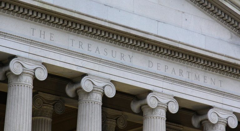 The federal government will lose an estimated $33.6 billion in corporate tax revenue without legislation to stop U.S. businesses from shifting their headquarters overseas, according to Congress' official tax scorekeeper. (iStock Photo)