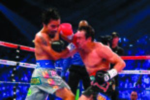 The Dec. 8 fight between Manny Pacquiao and Juan Manuel Marquez was held at the MGM Grand in Las Vegas. (AP)