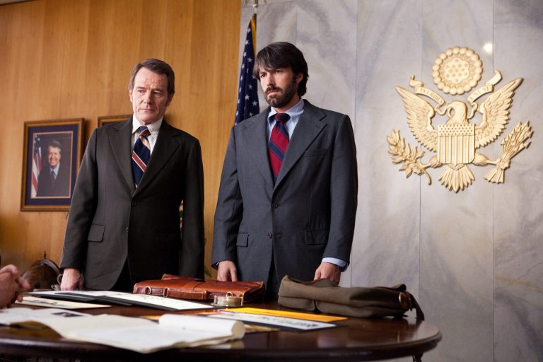 This film image released by Warner Bros. Pictures shows Bryan Cranston, left, as Jack OâDonnell and Ben Affleck as Tony Mendez in 