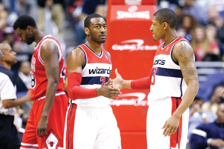 Rob Carr/Getty Images
Wizards guard John Wall had 27 points, nine assists, eight rebounds and two blocks in Washington's win over Chicago on Tuesday.
