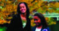 Malia Obama, left, with her sister Sasha. AP Photo.