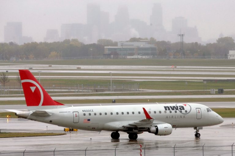 An active shooter near the airport has SWAT teams and local police in a frenzy. (AP Photo/Jim Mone)
