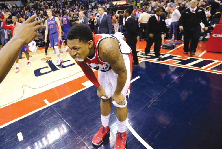 Alex Brandon/AP
Bradley Beal had the ball as time was running out, but his errant pass resulted in a poor shot by Trevor Ariza at the buzzer.