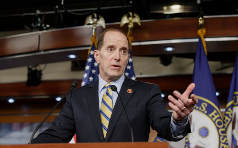 House Ways and Means Committee Chairman Rep. Dave Camp, R-Mich., the House tax writer, speaks with reporters on Capitol Hill in Washington on Wednesday. (AP Photo/J. Scott Applewhite)