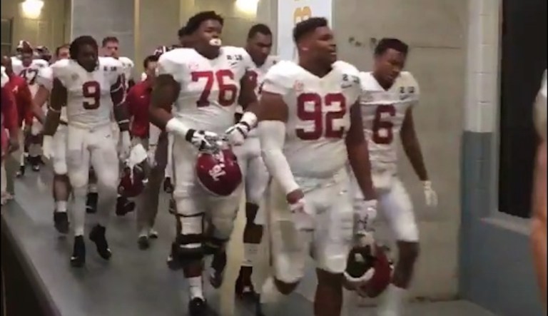 One of the University of Alabama's football players was caught on tape shouting an expletive directed at President Trump while heading out to the field Monday night. (screenshot)