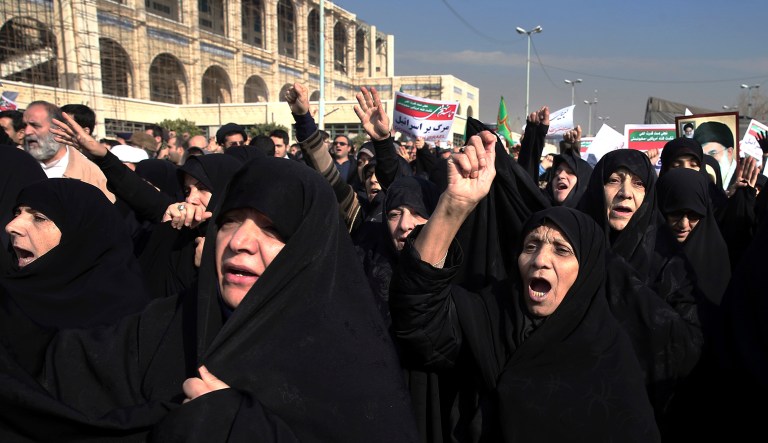 Iranian protesters chant slogans at a rally in Tehran on Saturday, Dec. 30, 2017. (AP Photo/Ebrahim Noroozi)