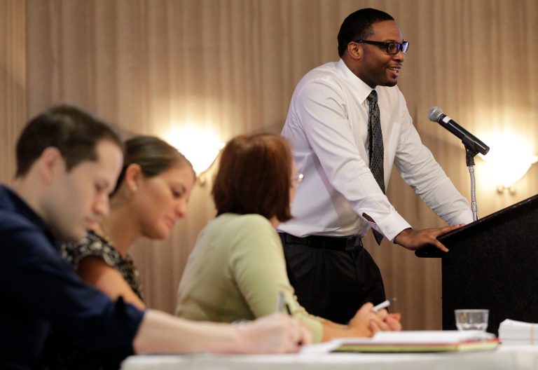   In this Thursday, Oct. 11, 2012, photo, a panel of Spirit Airlines employees make notes and listen as applicant Anthony Williams, top right, addresses a room full at a Flight Attendant Open House, in Dallas. The airline announced that it is hiring 250 positions that include flight attendants, pilots and mechanics to be based out of its newly announced crew base at Dallas-Fort Worth International Airport. U.S. employers advertised more job in October than September, a hopeful sign that hiring could pick up in the coming months. (AP Photo/Tony Gutierrez)  