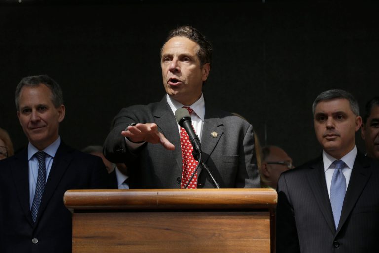 Gov. Cuomo speaks during a rally after the New York Wage Board endorsed a proposal to set a $15 minimum wage for workers at fast-food restaurants with 30 or more locations. (AP Photo)