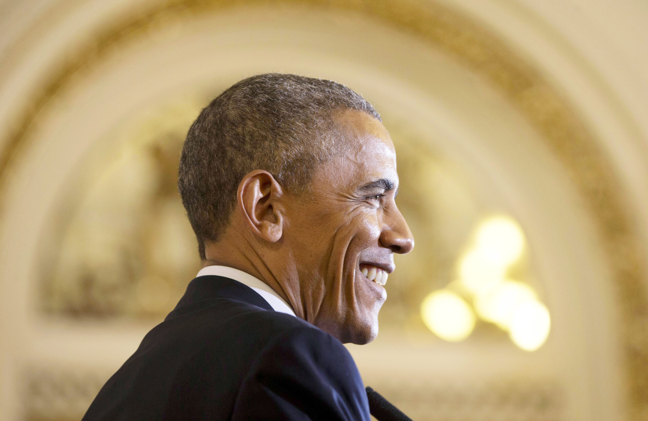 Dislike of Trump, Clinton help boost Obama to poll high