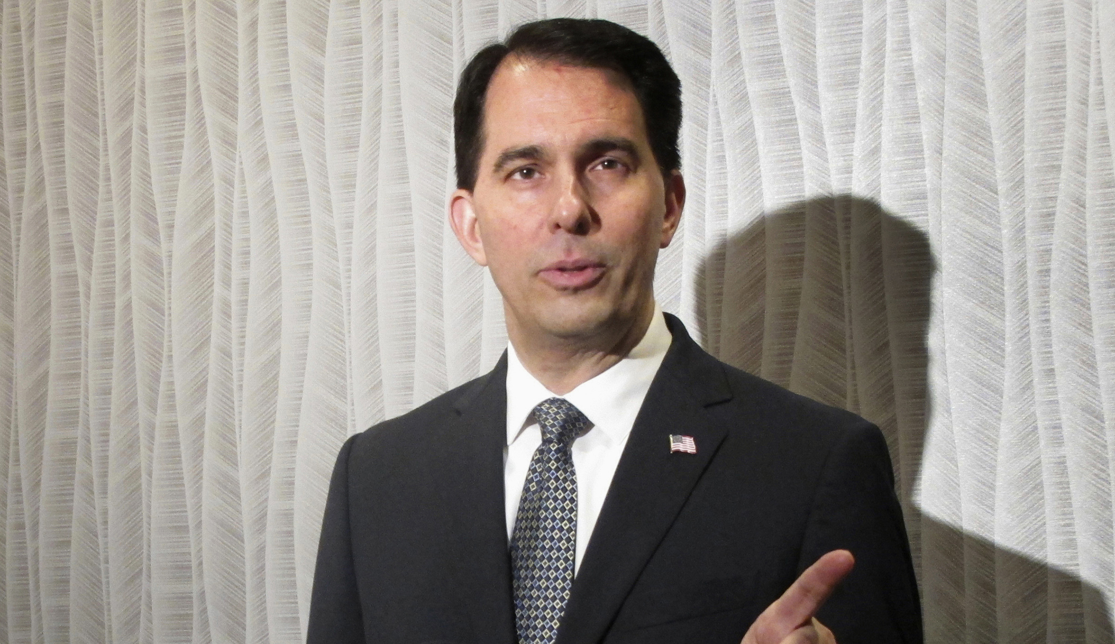 Scott Walker, avowed Obamacare opponent, passes law to shore it up