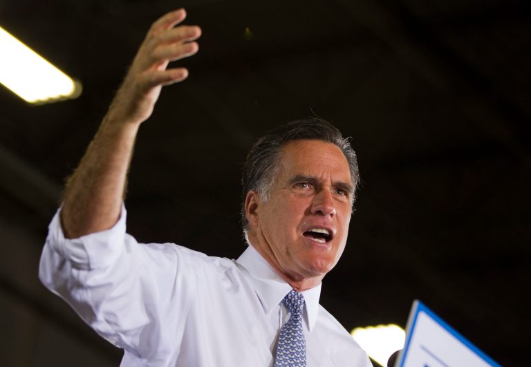   Republican presidential candidate, former Massachusetts Gov. Mitt Romney gestures during a campaign stop at Con-Air Industries, Tuesday, June 12, 2012, in Orlando, Fla. (AP Photo/Evan Vucci)  