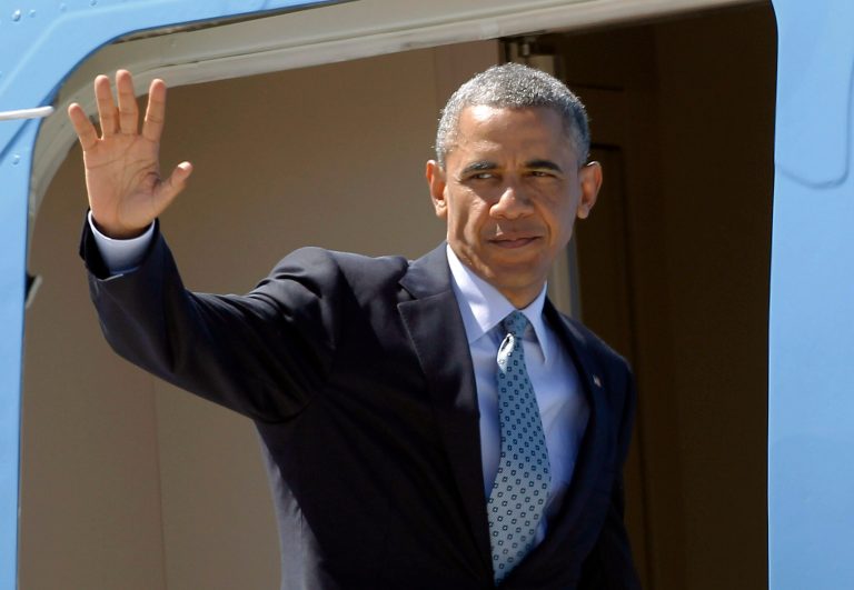 President Barack Obama waves to supporters as he boards Air Force One to return to Washington at Los Angeles International Airport Thursday, July 24, 2014 in Los Angeles. (AP Photo)