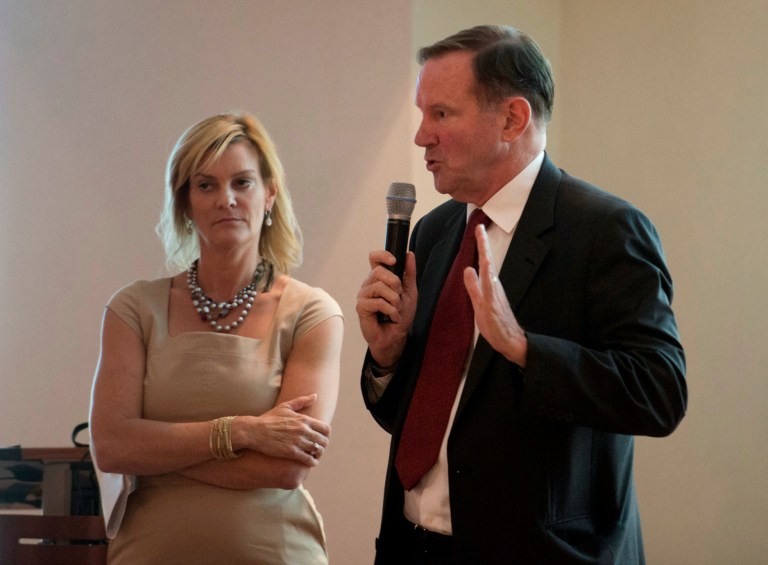   Katharine Weymouth, publisher and CEO of The Washington Post, left, and Donald Graham, CEO and chairman of The Washington Post Co., address employees about the sale of The Washington Post to Amazon.com founder Jeff Bezos, Monday, Aug. 5, 2013 in Washington. Bezos struck a deal Monday to buy The Washington Post and other newspapers for $250 million in a startling demonstration of how the Internet has created both winners and losers and utterly transformed the media landscape. (AP Photo/The Washington Post, Marvin Joseph) WASHINGTON TIMES OUT; NEW YORK TIMES OUT;THE WASHINGTON EXAMINER AND USA TODAY OUT; MAGS OUT; NO SALES  