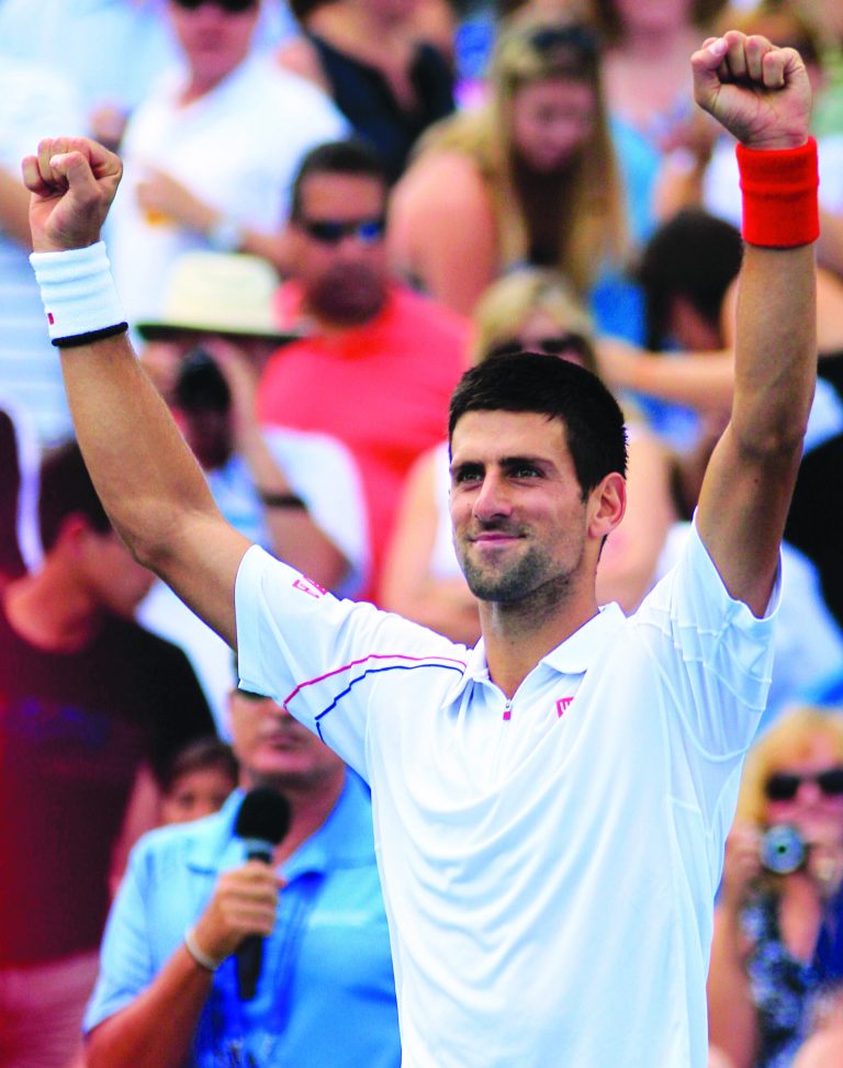 Al Behrman/AP
Defending champion Novak Djokovic is expected to contend for another U.S. Open title along with Roger Federer.
