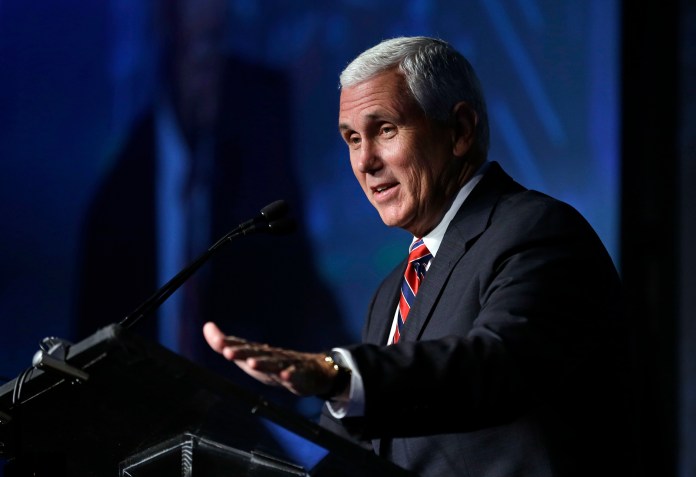 Indiana Gov. Mike Pence stuck to Donald Trump's position that immigration should be temporarily banned from countries with ties to terror. (AP Photo/Michael Conroy)