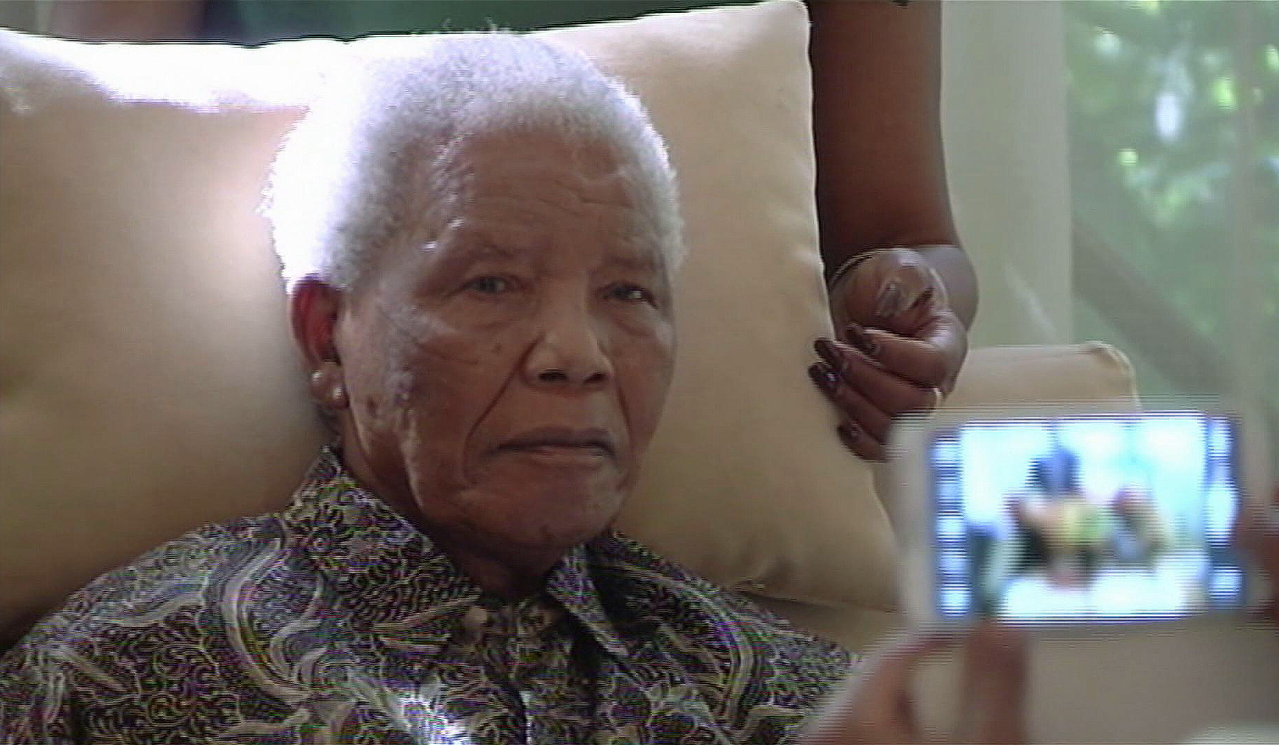 Nelson Mandela appears an ailing man in video