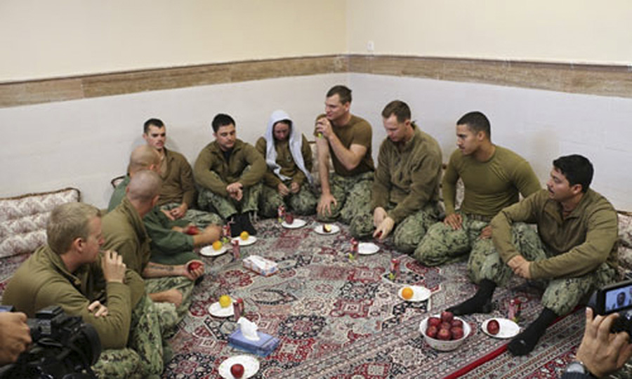 Sailors detained by Iran arrive home in San Diego