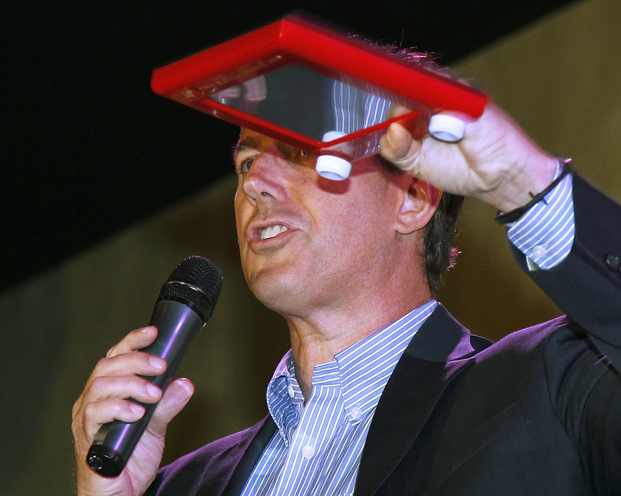 Romney foes launch Etch-A-Sketch attack