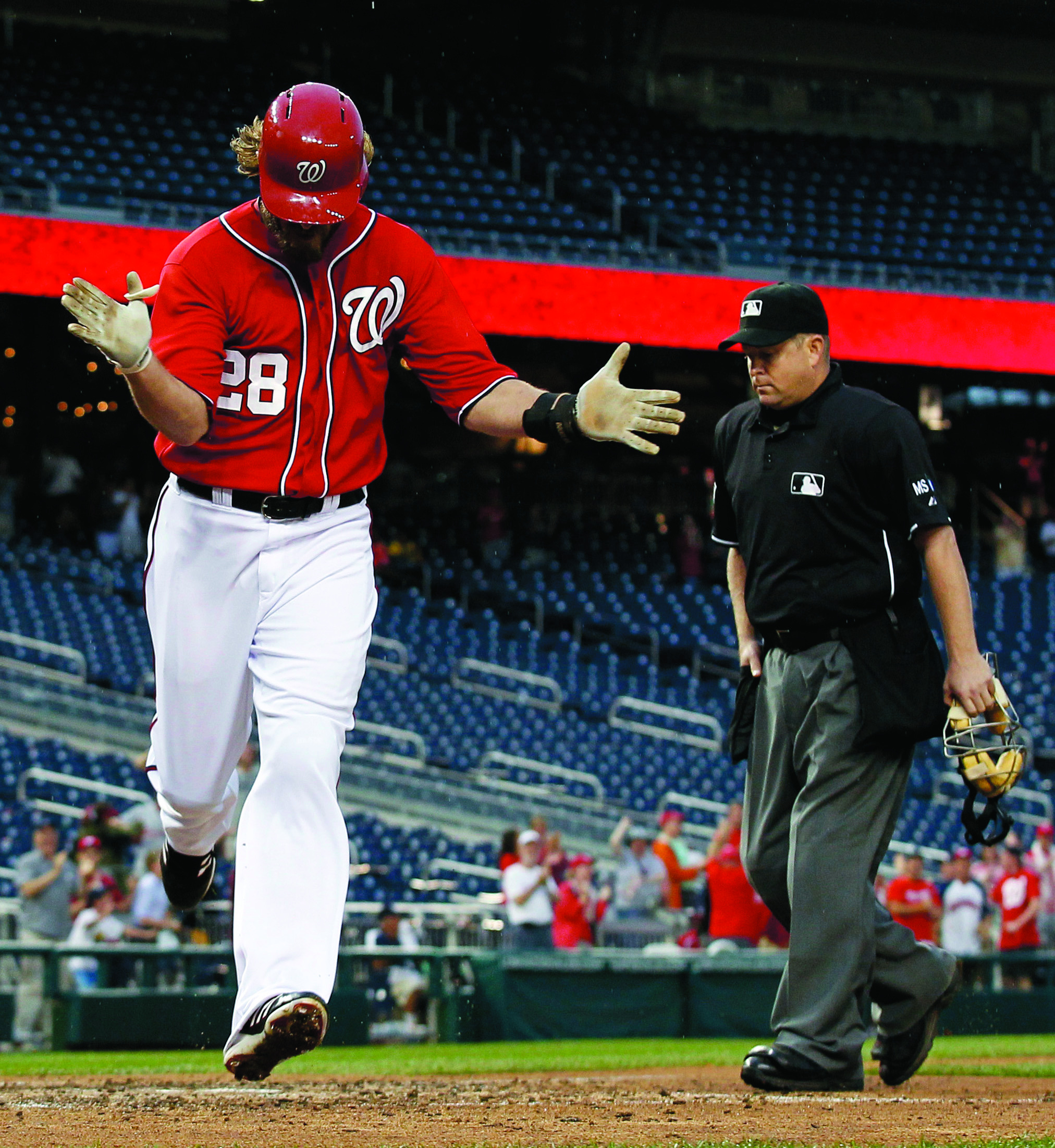 After long rain delay, Nationals storm to victory