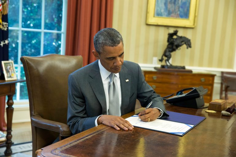 President Barack Obama signs 