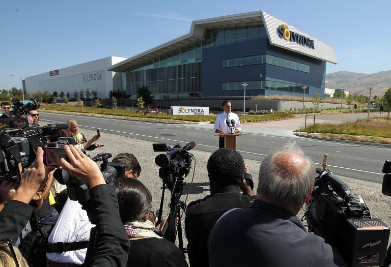 FREMONT, CA - MAY 31:  Repubican presidential candidate and former Massachusetts Gov. Mitt Romney speaks during news conference in front the shuttered Solyndra solar power company's manufacturing facility May 31, 2012 in Fremont, California.  The company filed for bankruptcy in 2011 after receiving $535 million in federal loan money.  (Photo by Justin Sullivan/Getty Images)