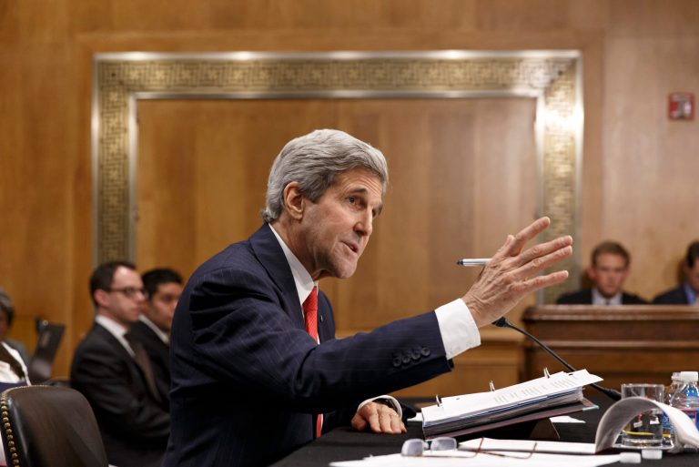 Secretary of State Kerry testifies on Capitol Hill in Washington, Tuesday, April 8, 2014, before the Senate Foreign Relations Committee to discuss his budget and the status of diplomatic hot spots. Lawmakers' questions focused on Russia, Ukraine, Iran and Syria. Kerry, a former chairman of the Foreign Relations Committee, threatened Russia with tougher economic sanctions if it fails to back down from its chaotic involvement in Ukraine. (AP Photo/J. Scott Applewhite)