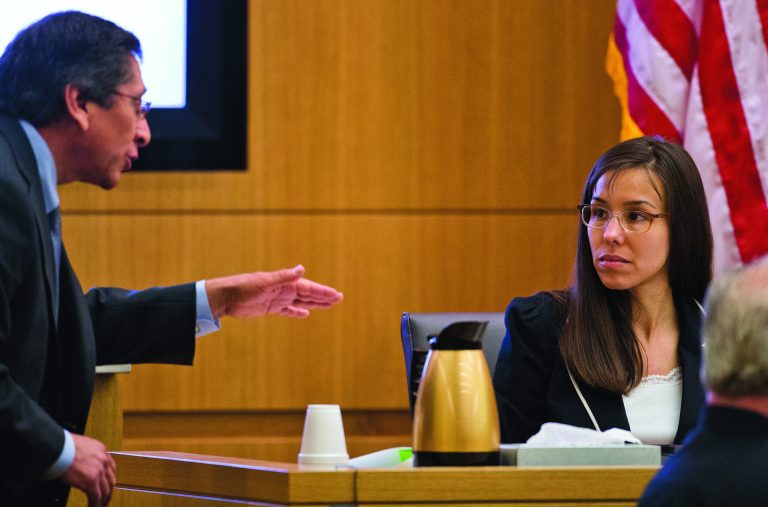 FILE - In this Feb. 21, 2013 file photo, Prosecutor Juan Martinez asks defendant Jodi Arias a question about her diary during cross examination testimony in Maricopa County Superior Court in Phoenix. Arias resumes testimony Monday, Feb. 25, 2013 in her Arizona murder trial after the start of a withering cross-examination last week by a prosecutor working to poke holes in her numerous stories. (AP Photo/The Arizona Republic, Tom Tingle, Pool)