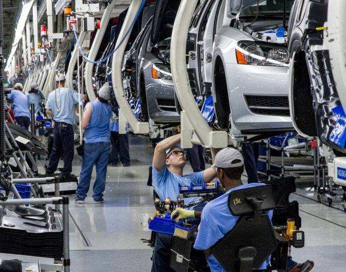 Workers assemble Volkswagen Passat sedans at the German automaker's plant in Chattanooga, Tenn. (AP Photo/Erik Schelzig)