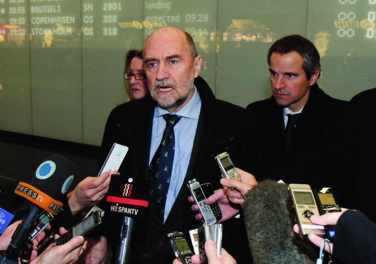 Herman Nackaerts, center, Deputy Director General and Head of the Department of Safeguards of the International Atomic Energy Agency, IAEA, talks to media after his arrival from Iran at Vienna's Schwechat airport, Austria,Thursday, Feb. 14, 2013. Senior officials of the U.N. atomic agency have returned from Tehran without a hoped-for deal that would have led to the resumption of a probe into allegations that Iran worked secretly on nuclear arms. (AP Photo/Ronald Zak)
