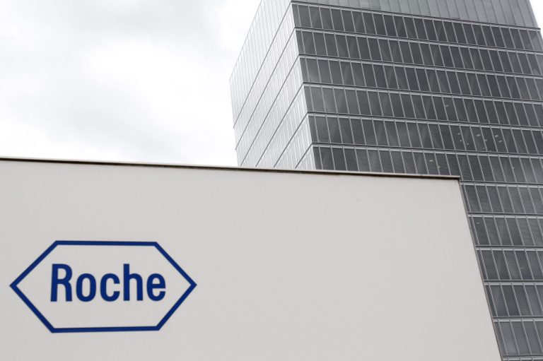 FILE - In this June 6, 2011 file picture the logo of Swiss company Roche is photographed in Rotkreuz, Switzerland. Swiss drugmaker Roche Holding AG on Thursday July 24, 2014  posted a net profit drop of 7 percent compared with a year ago, weighed down by a strong Swiss franc and charges from one of its diagnostic units. (AP Photo/Keystone,Urs Flueeler,File)