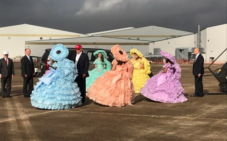 Upon landing at Birmingham-Shuttlesworth International Airport before heading to an event in Mobile, Ala., President-elect Trump was greeted Saturday by six Azalea Trail Maids. (Gabby Morrongiello/Washington Examiner)