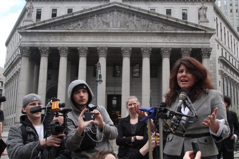 Author Naomi Wolf, center, asks if the Islamic State of Iraq and Syria beheading videos are staged? (AP Photo/Mary Altaffer)