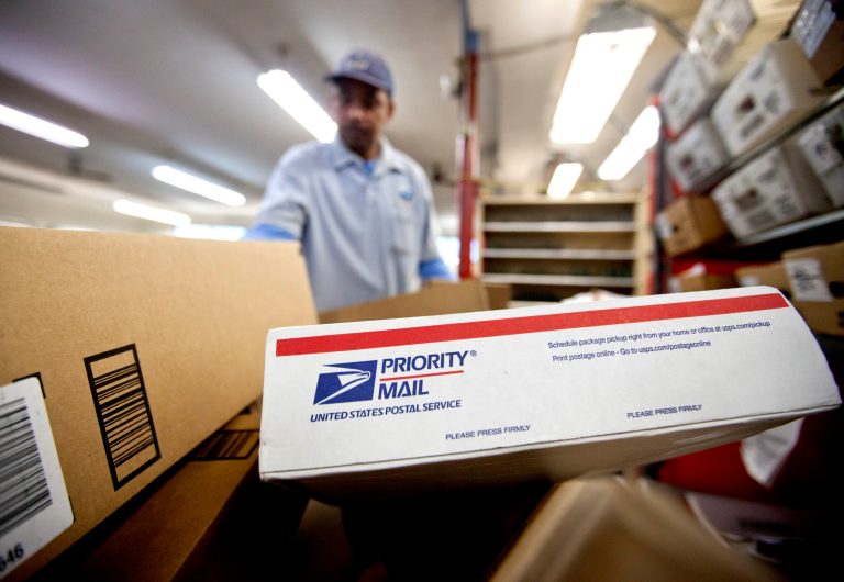 Packages wait to be sorted in a Post Office in Atlanta. (AP/David Goldman)