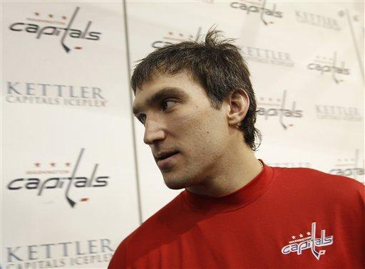 Washington Capitals captain Alex Ovechkin, from Russia, walks back to the locker room after speaking to members of the media about the new hockey coach Dale Hunter at the Kettler Capitals Iceplex in Arlington, Va., Monday, Nov., 28, 2011. Hunter, a former Capitals captain, takes over for Bruce Boudreau, who was fired. 