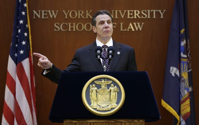 "Every woman should know that -- that they have more rights than they had before," said New York Gov. Andrew Cuomo. "And every male should know ... you're not getting away with what you got away with before." (AP Photo)