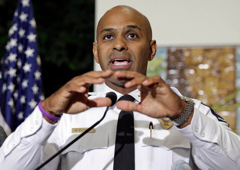 Charlotte-Mecklenburg Police chief Police Chief Kerr Putney gestures as he answers a question during a news conference after a second night of violence following Tuesday's fatal police shooting of Keith Lamont Scott in Charlotte, N.C. Thursday, Sept. 22, 2016. (AP Photo/Chuck Burton)