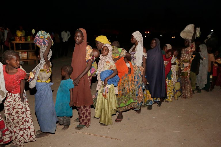 Women and children rescued by Nigeria soldiers from Islamist extremists arrive at a camp for the displaced people in Yola, Nigeria. (AP Photo/Sunday Alamba, File)