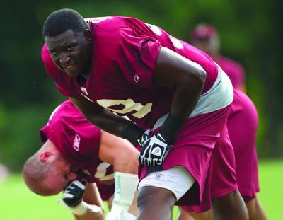 Redskins DE Jenkins stays positive after injury