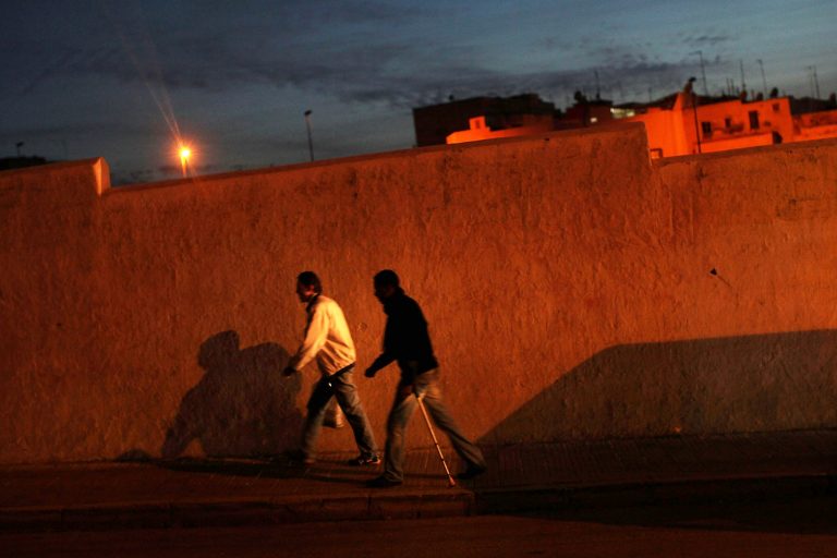 Two men walk up a street in Rabat, Morocco. (Spencer Platt/Getty images)