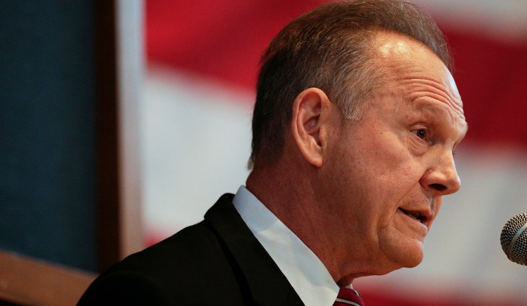 Moore leads Strange by 10 points, 50 to 40 percent, according to an Emerson College Polling Society poll released Sunday (AP Photo/Brynn Anderson)