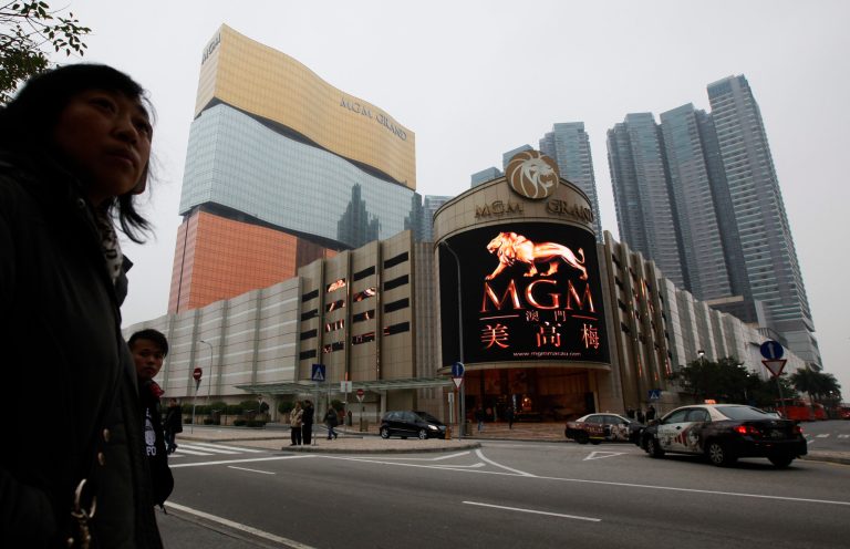 FILE - This Feb. 15, 2011, file photo shows a promotional screen with the Chinese characters for MGM displayed at the MGM Grand Macau casino resort, in Macau. MGM Resorts reports quarterly earnings on Tuesday, April 29, 2014. (AP Photo/Kin Cheung, File)
